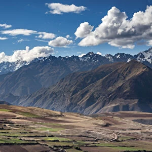 Idyllic farmlands against Peruvian Andes seen from Maras, Sacred Valley, Cuzco Region
