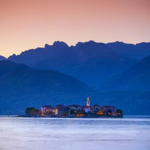 The idyllic Isola dei Pescatori (Fishermans Islands) illuminated at dusk, Borromean Islands