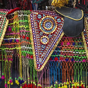 India, Rajasthan, Pushkar, Stall selling camel decorations and embellishments at Pushkar