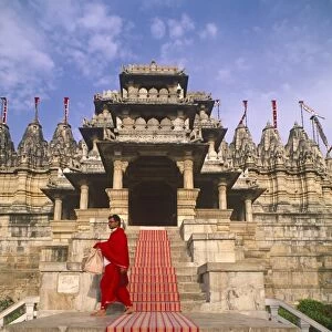 India, Rajasthan, Ranakpur. A priest at the famous Chaumukha Mandir, an elaborately sculpted Jain temple in the