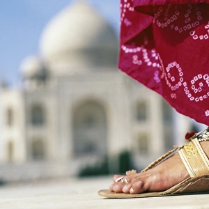 Indian foot & sari detail in front of the Taj Mahal, Agra