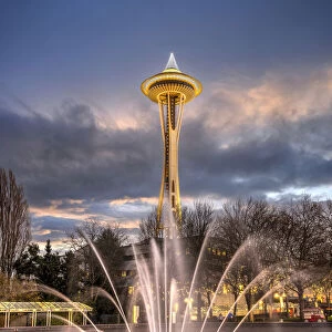 The International Fountain with Space Needle adorned with Christmas lights in