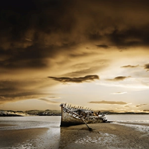 Ireland, Co. Donegal, Bunbeg, wrecked boat on coastline