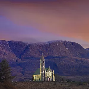 Ireland, Co. Donegal, Sacred heart church at Dunlewey illuminated at dusk