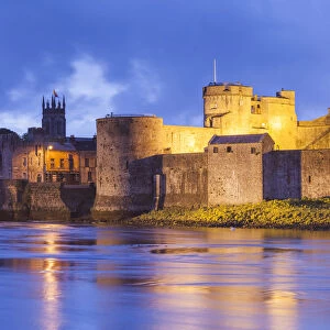 Ireland, County Limerick, Limerick City, King Johns Castle, 13th century, dusk
