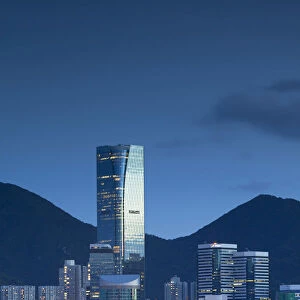 One Island East skyscraper and apartment blocks at dusk, Tai Koo, Hong Kong Island