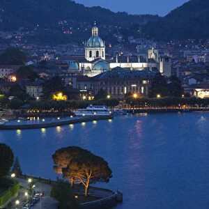 Italy, Lombardy, Lakes Region, Lake Como, Como, city view from Bellagio road, evening