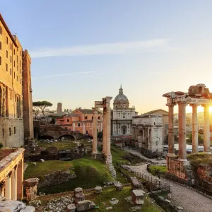 Italy, Rome, Colosseum and Roman Forum at sunrise