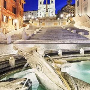 Italy, Rome, Spagna Square with Trinita dei Monti and Barcaccia fountain by night