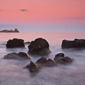 Italy, Sicilia, Sicily, Last light at dusk, in the background the Cyclopes stacks