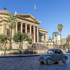 Italy, Sicily, Palermo, Teatro Massimo, a vintage Fiat Uno drives past the Opera House