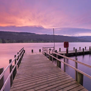 Jetty on Coniston Water at sunrise, Lake District, Cumbria, England