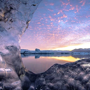 Jokulsarlon glacier lagoon, East Iceland. The lagoon seen from a transparent block of ice