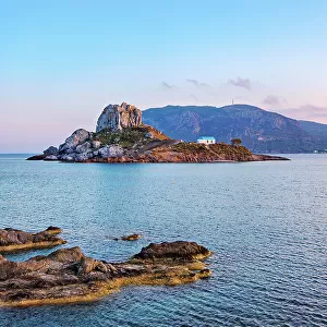 Kastri Island seen from Agios Stefanos Beach at sunset, Kamari Bay, Kos Island, Dodecanese, Greece
