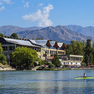 Kayakers on the lake with Andes in the background, General San Martin Park, Mendoza