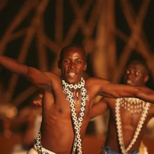 Kigali, Rwanda. A Intore dancer entertains at FESPAD Pan African dance festival