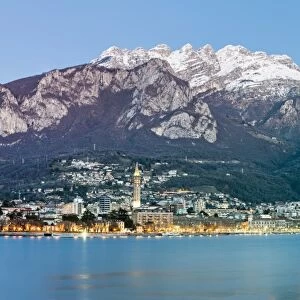 Lake Como, Lombardy, Italy. Panoramic view of Lecco city at dusk with the Resegone