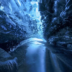 Light games inside an ice cave in Vatnajokull National Park, Iceland