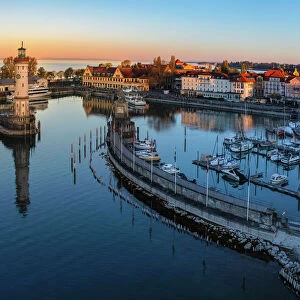 Lindau harbour with Mangturm Tower and Lighthouse at Sunrise, Lake Constance, Swabia, Bavaria, Germany