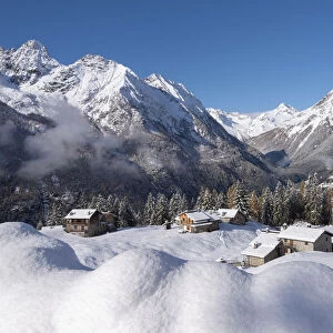 Little village of Barchi after the first snowfall, Valtellina, Sondrio Province, Lombardy