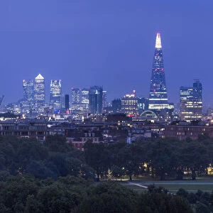 London skyline with the Shard above Hyde Park, London, England, UK