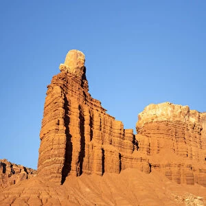 Low angle view of Chimney Rock and solitary tree, Capitol Reef National Park, Utah