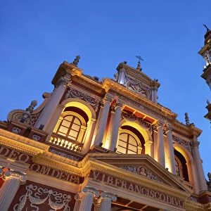 The main facade of the Basilica Menor y Convento de San Francisco church at twilight