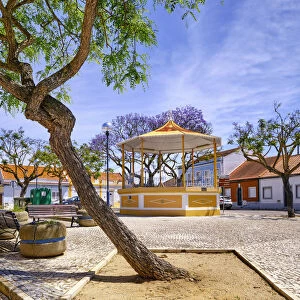 The main square of the fishing village of Rosario with the traditional bandstand, Moita