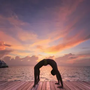 Maldives Print: Yoga at Sunset on Thudufushi Beach Maldives Print: Yoga at Sunset on Thudufushi Beach