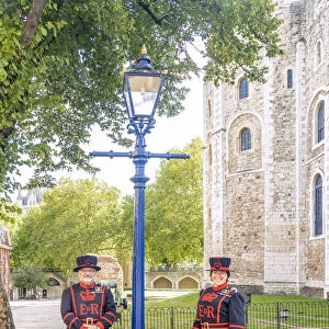 Male and female Beefeaters or Yeoman at the Tower of London, UNESCO World Heritage site