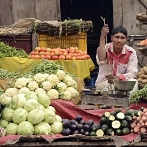 Man at his market stall, City of Karauli, Rajasthan, India