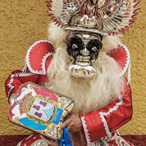 Man in traditional clothing, Fiesta de la Virgen de la Candelaria, Puno, Peru