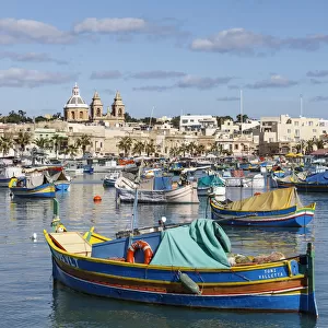 Marsaxlokk, Malta, famous for its colorful fishing boats called Iuzzu