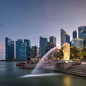 The Merlion statue with city skyline in the background, Marina Bay, Singapore