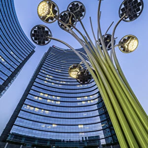 Milan, Lombardy, Italy. Gae Aulenti Square with iconic streetlights