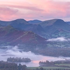 Misty sunrise over Derwent Water and the Newlands Valley, Lake District, Cumbria, England