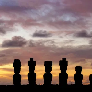 Moais in Ahu Nau Nau by the Anakena Beach at sunset, Rapa Nui National Park, Easter Island