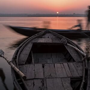 Moments of life, on Ganges shores, with wooden boat, Varanasi, Uttar Pradesh, India