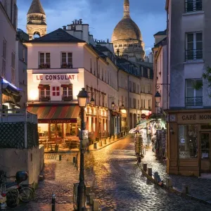 Montmartre at night with illuminated Sacre Coeur Basilica in the background, Paris Montmartre at night with illuminated Sacre Coeur Basilica in the background, Paris