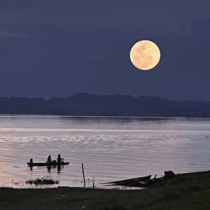 Full Moon over the Amazon River, near Puerto Narino, Colombia