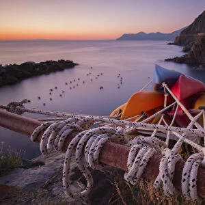 Moored canoes in Riomaggiore, Cinque Terre, Liguria, Italy