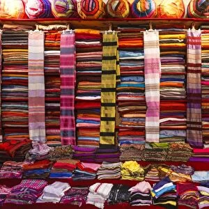 Morocco, Marrakech, Textiles and fabrics in a souk