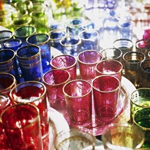 MOROCCO, Marrakesh Colourful Moroccan glassware in the souqs of Marrakesh