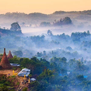 Mrauk-U, Rakhine state, Myanmar. Mrauk-U valley in a foggy sunrise seen from the Shwetaung
