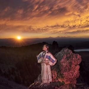 Native woman, Acosia M. Red Elk, in historic buckskin dress on top of Paulina Peak