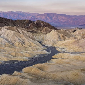 Natural rock formations at Zabriskie Point during sunrise, Death Valley National Park