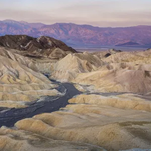 Natural rock formations at Zabriskie Point during sunrise, Death Valley National Park