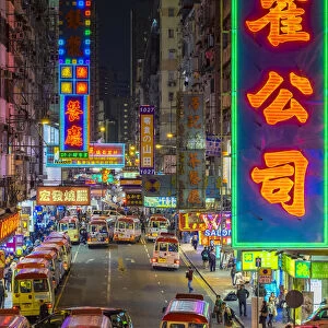 Neon lights on Tung Choi Street in Mong Kok at night, Kowloon, Hong Kong, China