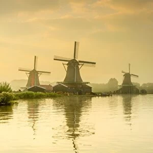 Netherlands, North Holland, Zaandam, Zaanse Schans, left to right The Seeker (De Zoeker) Oilmill