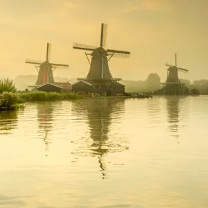 Netherlands, North Holland, Zaandam, Zaanse Schans, left to right The Seeker (De Zoeker) Oilmill